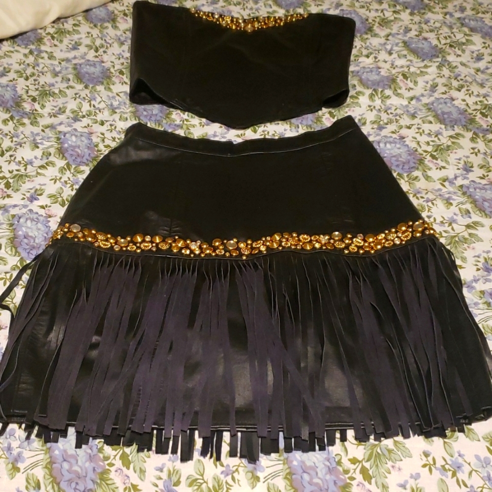 Size 5-6 Blk Leather fringed skirt and bustier . Night club wear